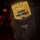 Card game box labeled 'Utopia Pre-Party' in a pocket with a blurred background